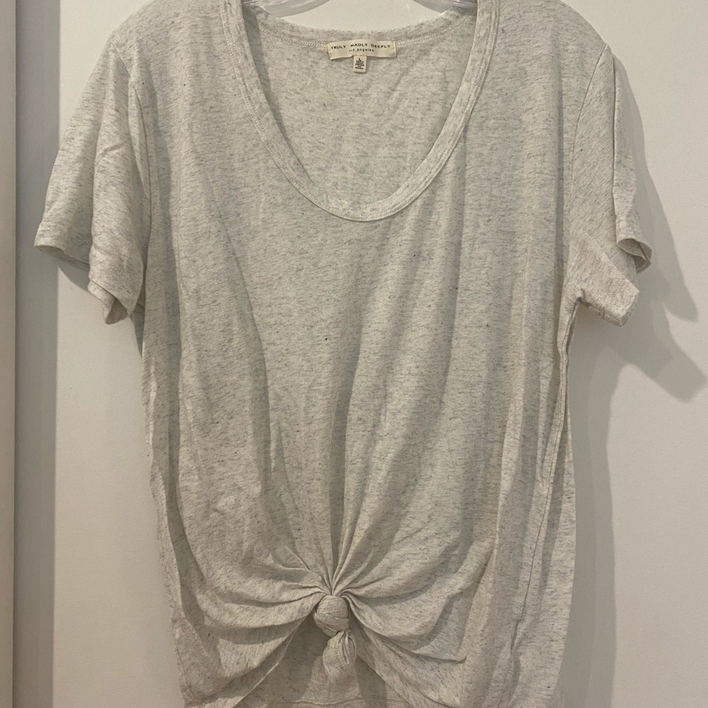 Truly Madly Deeply Knotted Top